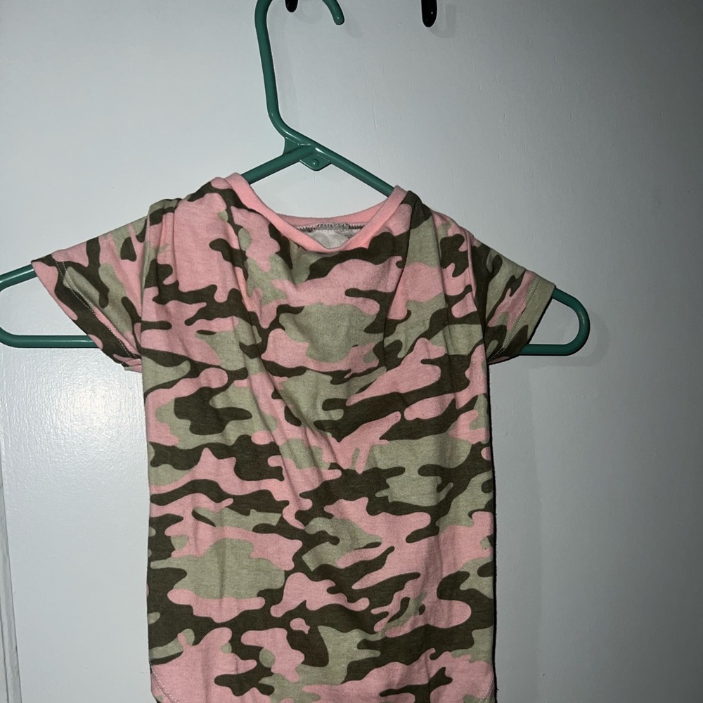 Pink and Green Camouflage it will fit a French bulldog/winnie size dog